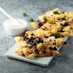 Homemade savory tart with onion and olives