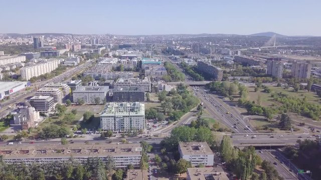 Amazing aerial shot of New Belgrade highway and roundabout, Serbia 4k summer day