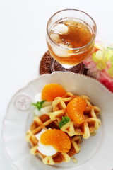 Canned mandarin orange and waffle for gourmet breakfast