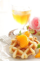 Canned mandarin orange and waffle for gourmet breakfast