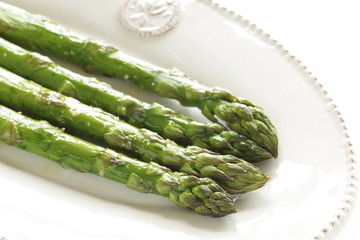 Chinese food, grilled green asparagus on dish