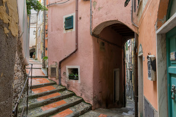 Typical narrow street in the old town of Tellaro in Italy