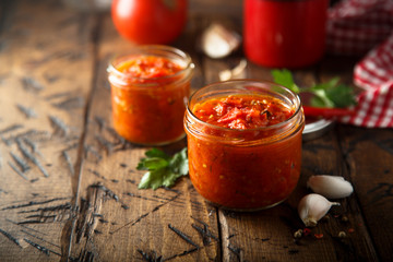 Homemade tomato sauce in the jars - obrazy, fototapety, plakaty