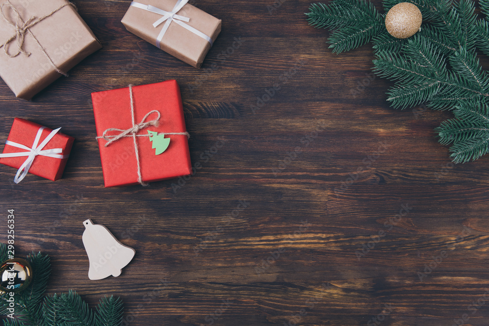 Wall mural top high angle close up view photo of festive natural rustic composition of different packed giftbox