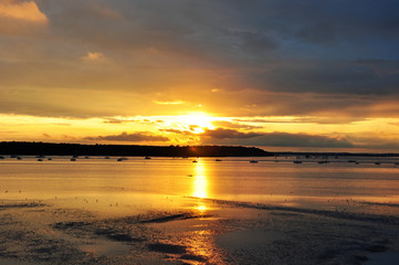 Fototapeta na wymiar Sunset in Sandbanks, Poole harbour, Dorset, England, in the Summertime