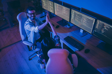 Good job. High angle above view photo of it specialist guy lady two business people work night did...