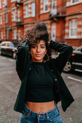 Portrait Charming Young African Woman with Curly Hair, Street Style