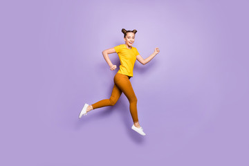 Fototapeta na wymiar Full size profile photo of amazing lady jumping high rushing to finish line championship race wear yellow t-shirt pants isolated pastel purple background