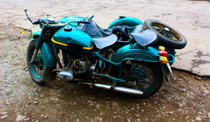 A motorcycle with a sidecar stands on the road