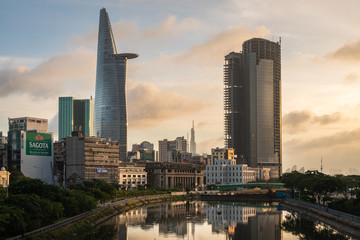 City Skyline of Ho Chi Minh cityscape at Sunset, Bitexco Tower in the financial area riverside. Saigon, Vietnam