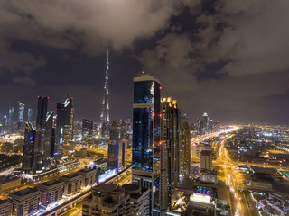 Fototapeta na wymiar Panoramic aerial view of Dubai skyline at night, United Arab Emirates