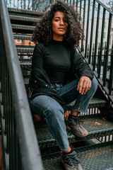 Portrait Charming Young African Woman with Curly Hair, Street Style