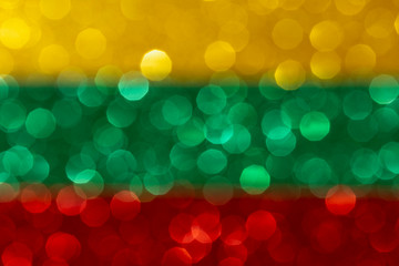 cloroful abstract background with bokeh, patriotic flag with yellow green red colors, festive template with defocused glitter effect