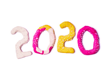 2020 New year design concept. Colored plasticine figures isolated on white background