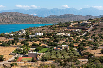 Fototapeta na wymiar Plaka, Crete, Greece. October 2019. An overview of inland properties and olive groves of Plaka a Cretan coastal town.
