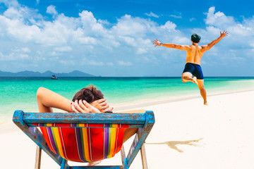 Activity summer lifestyle couple traveler joy relaxing on tropical white sand beach, Attraction scenic tourist travel Phuket Thailand fun beach Tourism beautiful destination Asia holiday vacation trip