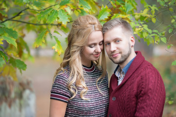 A portrait of young married couple expecting a baby