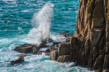 water sea crashing against rocks