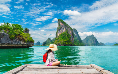 Traveler woman looking amazed nature scenic landscape tropical island Phang-Nga bay Adventure...