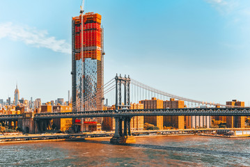 New York, USA, Lower Manhattan  and Brooklyn Bridge across the East River between Manhattan and Brooklyn.