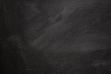 Abstract texture of chalk rubbed out on blackboard or chalkboard background, concept for education, banner, startup, teaching , etc.