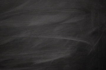 Abstract texture of chalk rubbed out on blackboard or chalkboard, concept for education, back to school, creatively, teaching , etc.