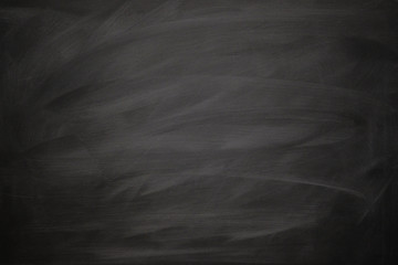 Abstract texture of chalk rubbed out on blackboard or chalkboard, concept for education, back to school, creatively, teaching , etc.