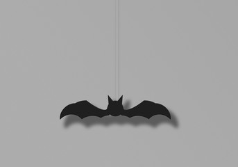 Illustration of a bat ornament hanging on the wall.  壁に吊り下げられたコウモリの飾りのイラスト