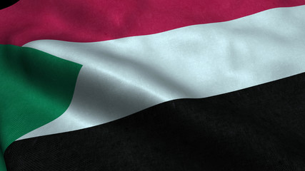 Sudan flag with visible wrinkles and realistic fabric.