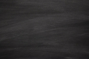 Fototapeta premium Abstract texture of chalk rubbed out on blackboard or chalkboard background, concept for education, banner, startup, teaching , etc.