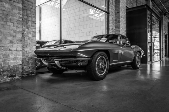 Sports car Chevrolet Corvette Sting Ray (C2) on May 01, 2019 in Berlin, Germany. Black and white.