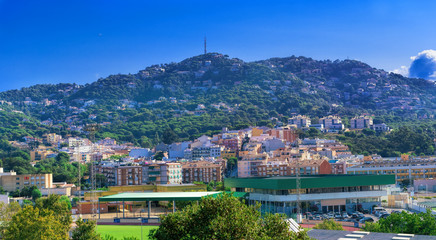 Fototapeta premium Spanish city on the hills at summer. Lloret de mar, Spain