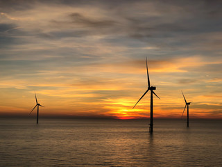 Offshore Wind Turbines at sunset