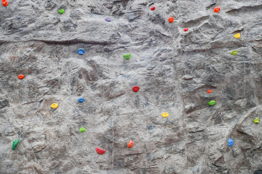 Grey wall. climbing a rock wall indoor - Image