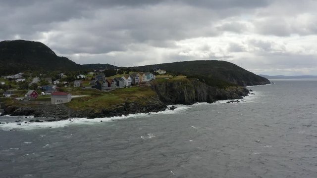 Aerial view of ocean and townhouses in newfoundland