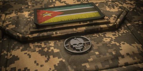 Republic of Mozambique army chevron on ammunition with national flag. 3D illustration
