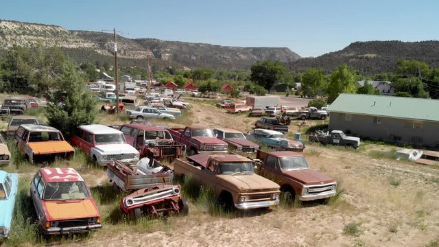 UTAH, USA - JUNE 2018: Aerial view of vintage old cars. Vehicle wreckages on a abandoned parking