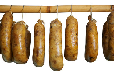 Traditional portuguese sausage alheira hanging in a smokehouse