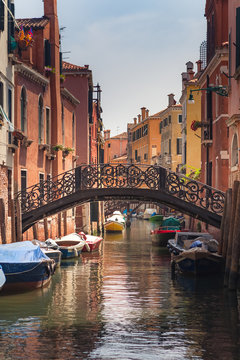 beautiful bridge with forged handrails over a canal in Venice in the Cannaregio district © OlgaKhorkova