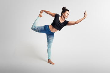  Dancer pose, yoga pose, woman on white background