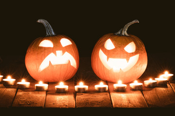 Halloween pumpkin head jack lantern with burning candles