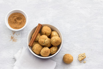 Freshly baked snickerdoodle cookies with cinnamon on gray background, top view. traditional american cookies	