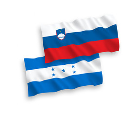 Flags of Slovenia and Honduras on a white background