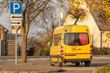 Plakat School bus standing on the parking