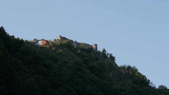 Vlad Tepes Dracula Poenari castle on top of the hill 4K tilting video