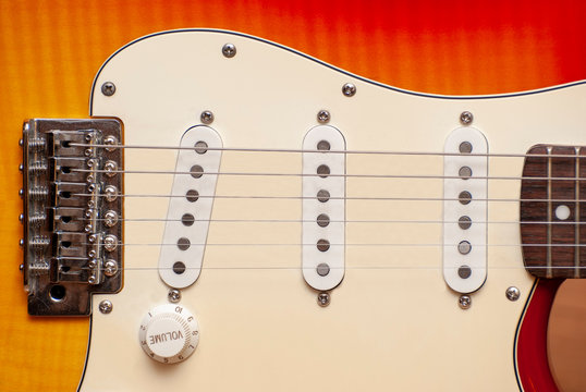 the location of the strings of the electric guitar relative to the pickup.