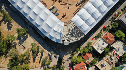 Aerial drone photo of under construction stadium of AEK near famous Park of Filadelfia, Athens, Attica, Greece - obrazy, fototapety, plakaty