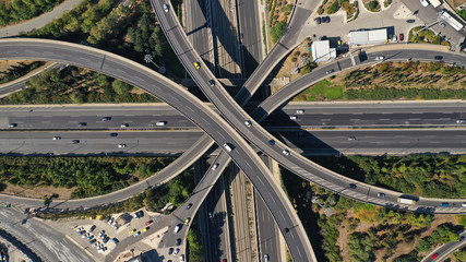 Aerial drone top down photo of urban multilevel highway junction with light traffic