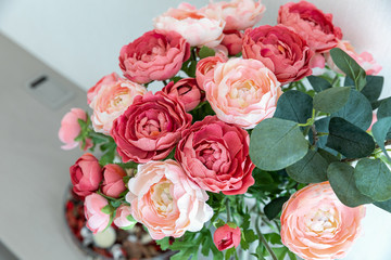 Beautiful bouquet fake flowers composition