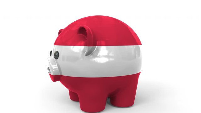 Coins fall into piggy bank painted with flag of Austria. National banking system or savings related conceptual 3D animation